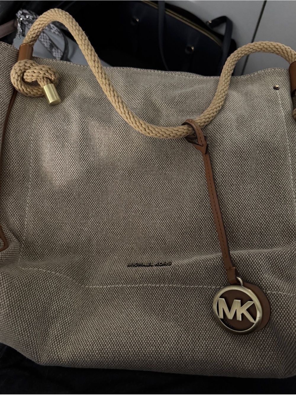 MICHAEL Michael Kors Isla Large Canvas Grab Tote in the color Natural